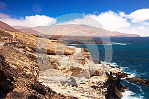 Ajuy coastline with vulcanic mountains on Fuerteventura island, Canary Islands, Spain. photo