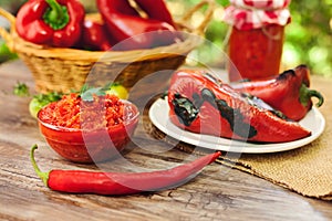 Ajvar in bowl with red paprika