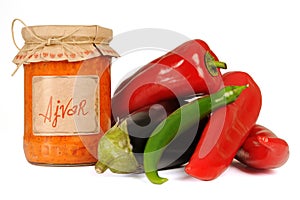 Ajvar - delicious dish of red and green peppers, onions, garlic, eggplant. Ajvar in jar.