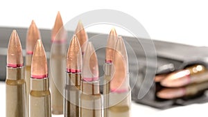 AK-47 ammunition 7,62x39mm, Defocus on a bunch of upright bullets. From the foremost to the rearmost