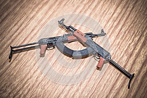Ak47 svd dragunov toy gun and mimic weapons and toy scale on woods texture and woods backgrounds