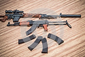 Ak47 svd dragunov toy gun and mimic weapons and toy scale on woods texture and woods backgrounds