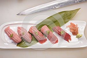 Akami Chutoro Otoro . Various type of blufin tuna sushi in japanese restaurant, before serving with japan knife