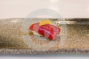 Akami Zuke Nigiri Topping Uni On Japanese Dish With Copy Space