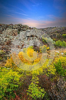 Aktovsky Canyon in Ukraine surrounded large stone boulders photo