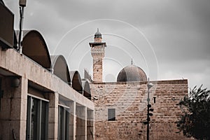 Al-Aqsa Mosque in the Old City of Jerusalem under a cloudy gloomy sky