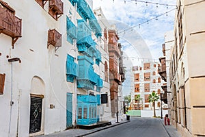 Al-Balad old town with traditional muslim houses with wooden windows and balconies, Jeddah photo