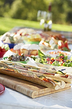 Al Fresco Dining, With Food Laid Out On Table