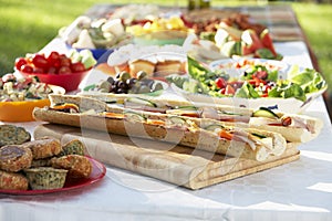 Al Fresco Dining, With Food Laid Out On Table