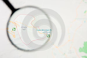 Al Hada city in Saudi Arabia visualization illustrative concept on display screen through magnifying glass