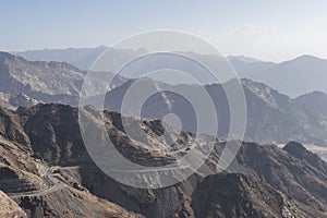 Al Hada Mountain in Taif City, Saudi Arabia with Beautiful View of Mountains and Al Hada road inbetween the mountains. photo