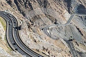 Al Hada Mountain in Taif City, Saudi Arabia with Beautiful View of Mountains and Al Hada road inbetween the mountains. photo