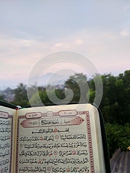 Al quran in morning with mountain view