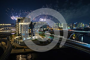 Al Raha Beach at Night with Fireworks Display over Yas Island in Abu Dhabi