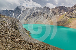 Ala-Kul lake in the Terskey Alatau mountain range in Kyrgyzst photo