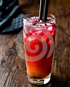 Alabama Slammer Cocktail with black straw.