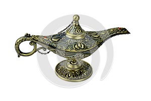 Aladdinâ€™s magical genie lamp,a antique lamp displayed over a white background