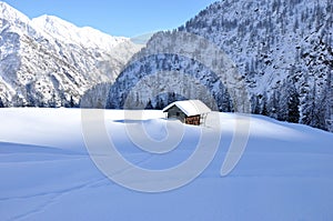 Alps winter chalet photo