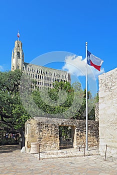 Alamo grounds, Texas flag and and Emily Morgan Hotel