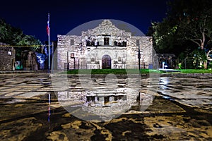 The Alamo in San Antonio, Texas during night after a rainfall wi photo