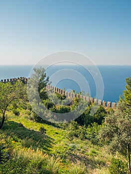 Alanya, Turkey. Beautiful view from the fortress Alanya Castle of the Mediterranean Sea and Cleopatra beach at sunset
