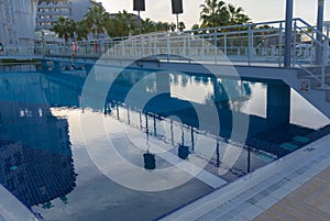 Alanya, Turkey - October 05, 2018. Beautiful pool in Kirman Sidera Luxury hotel with clear blue water on background of sea, blue