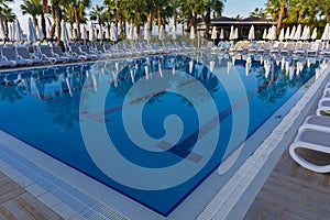 Alanya, Turkey - October 05, 2018. Beautiful pool in Kirman Sidera Luxury hotel with clear blue water on background of sea, blue