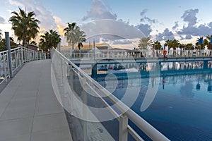 Alanya, Turkey - October 05, 2018. Beautiful pool in Kirman Sidera Luxury hotel with clear blue water on background of sea, blue