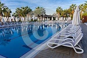 Alanya, Turkey - October 05, 2018. Beautiful pool in Kirman Sidera Luxury hotel with clear blue water on background of sea, blue