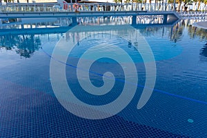 Alanya, Turkey - October 05, 2018. Beautiful pool in Kirman Sidera Luxury hotel with clear blue water on background of sea, blue