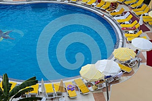 Alanya, Turkey - October 05, 2018. Beautiful pool in Kirman Sidera Luxury hotel with clear blue water on background of sea, blue