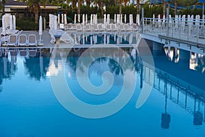 Alanya, Turkey - October 05, 2018. Beautiful pool in Kirman Sidera Luxury hotel with clear blue water on background of sea, blue