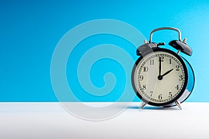 Alarm Clock on colorful background with selective focus
