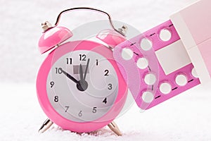 Alarm clock and contraceptive pills