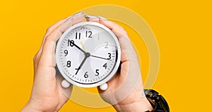 alarm clock on hand the importance of time time and work time concept