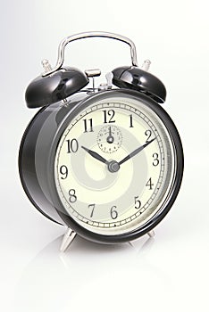 Alarm clock isolated over white