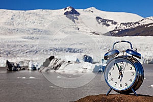 Alarm Clock Melting Glacier in Iceland, Climate Change Concept