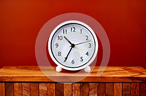 Alarm clock, modern clock, work with time, appointments, punctuality, rules of time, stationary clock hands. The importance of