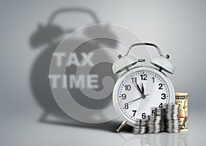 Alarm clock with money and tax time shadow, financial concept