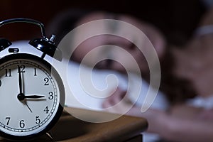 Alarm clock on night table