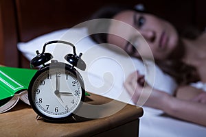 Alarm clock showing 3 a.m.