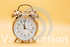 Alarm clock shows that the time to vaccinate is running out and must deliver vaccinates astrazeneca, biontech or moderna photo