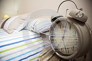 Alarm clock on a table photo