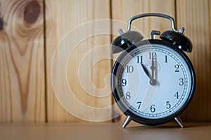 Alarm clock on table. Time photo