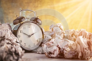 Alarm clock in a wastepaper concept