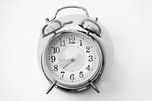 Alarm clock on white background photo