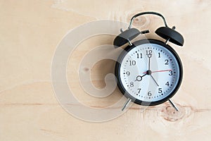 Alarm clock with wooden floor