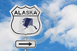 Alaska map and state flag on a USA highway road sign