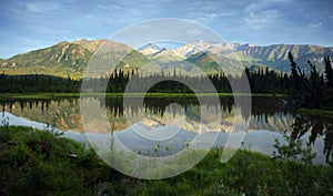 Alaska mountains and wilderness outback lake photo