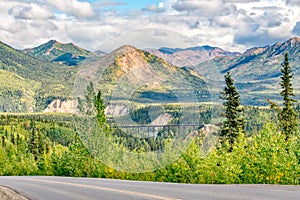 Alaska mountains with railroad bridge